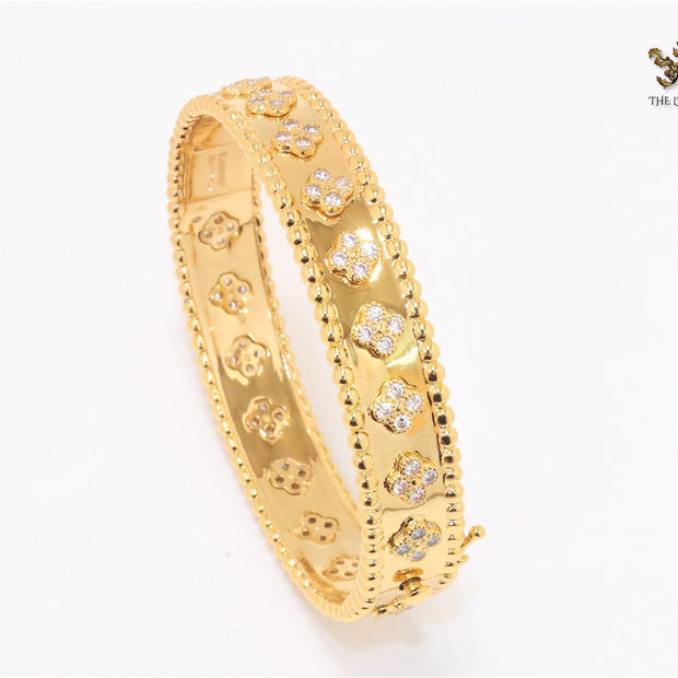 Gold clover motif CZ bracelet