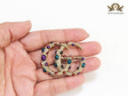 Rustic twin G brooch with multi coloured stones