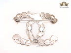 Antique platinum finish double C brooch with multi coloured stones
