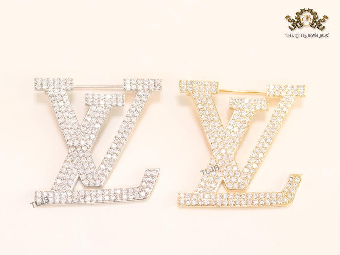 Stylish Land V brooch in cz and rose gold finish