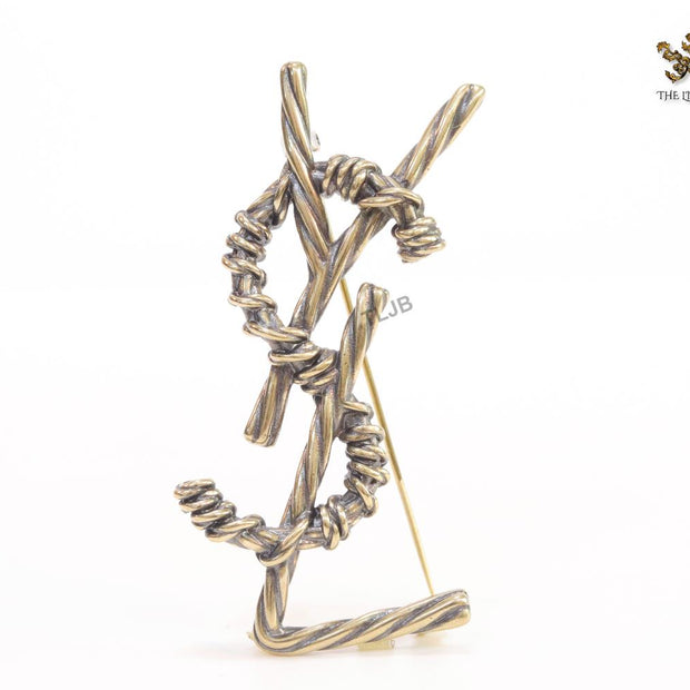 Antique gold finish alphabet brooch
