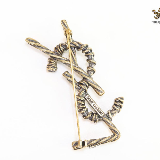 Antique gold finish alphabet brooch