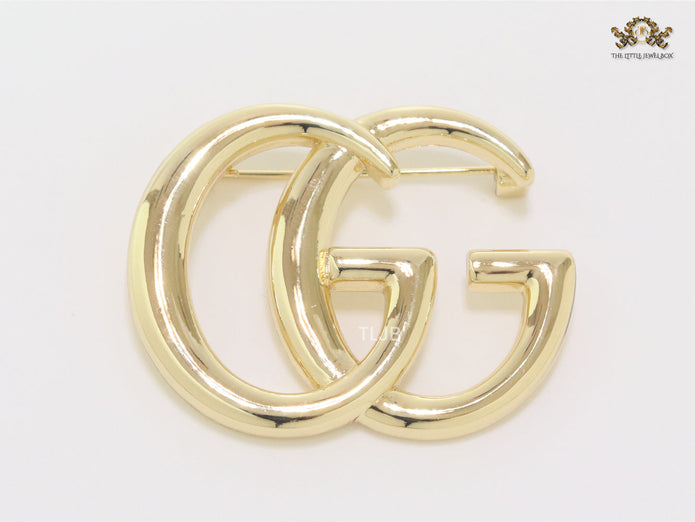 Double G Brooch in shiny Gold