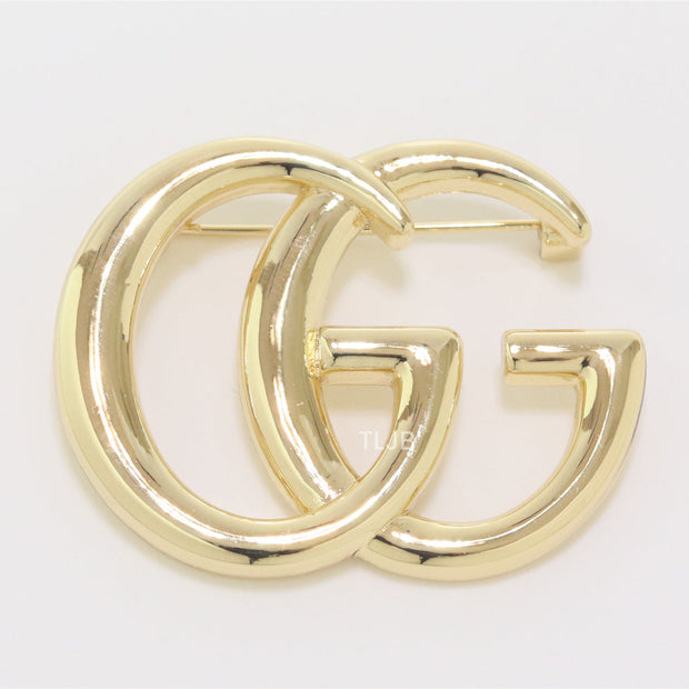Double G Brooch in shiny Gold