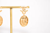 Gold double C Logo Drop Earrings with Paris Charm