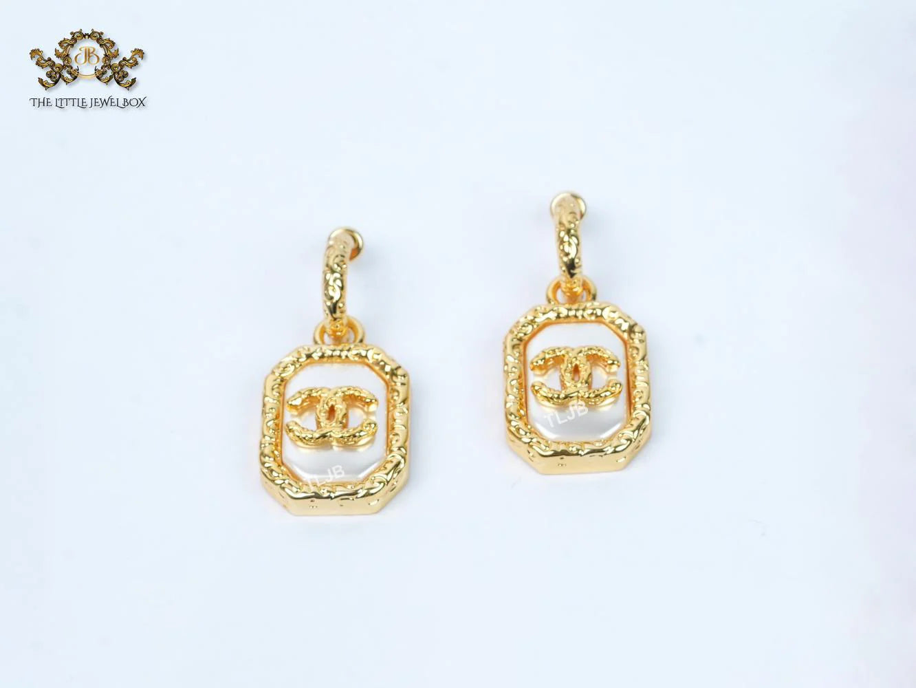 Double C white mop gold embossed danglers
