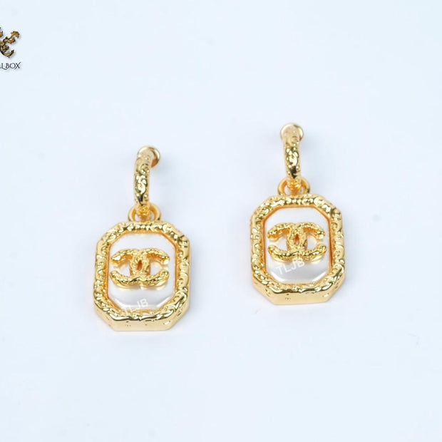 Double C white mop gold embossed danglers