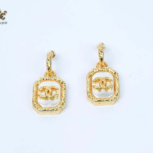 Double C white mop gold embossed danglers