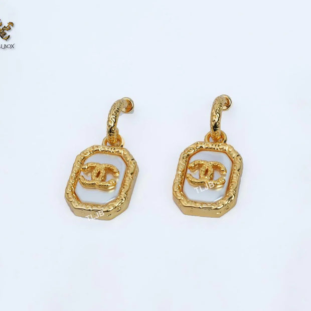 Double C white mop gold embossed danglers
