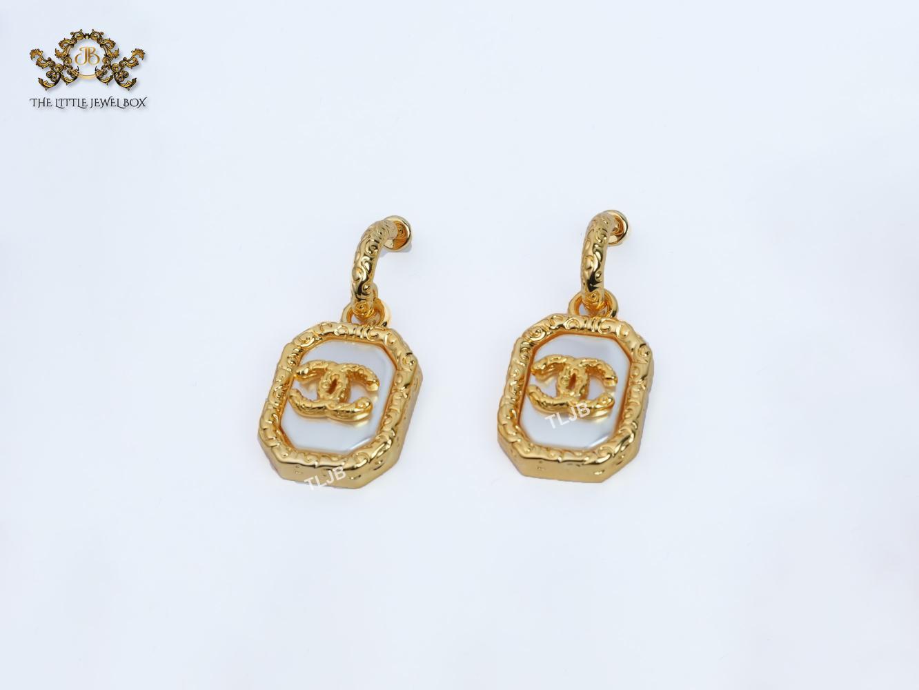 Double C white mop gold embossed danglers