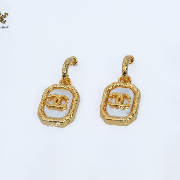 Double C white mop gold embossed danglers