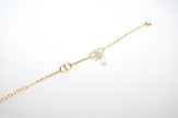 Gold Bow CZ Bracelet with Pearl Charm