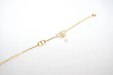 Gold Bow CZ Bracelet with Pearl Charm
