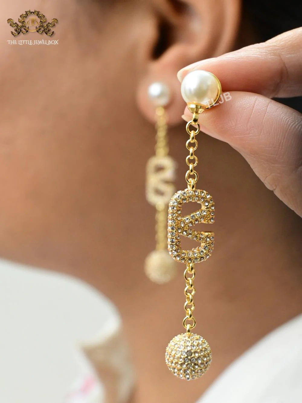 Alphabet V gold long chain danglers with cz ball