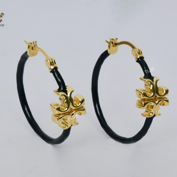 Alphabet T gold and black enamel hoops