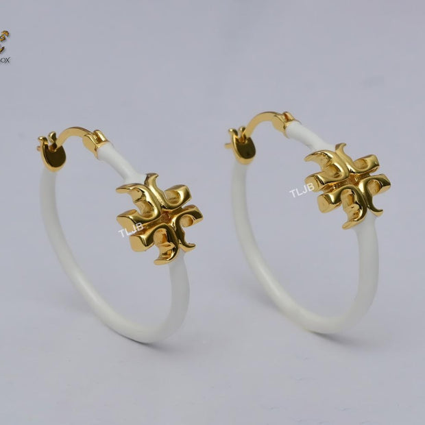 Alphabet T gold and white enamel hoops