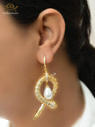 Platinum snake & pearl statement earrings