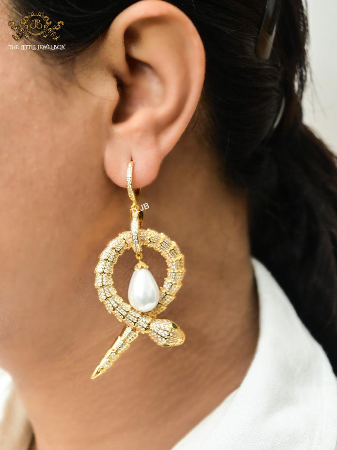Platinum snake & pearl statement earrings