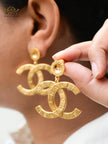 Double C embossed button gold danglers