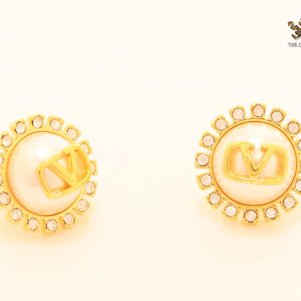 Open V pearl and gold cz studs