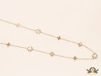 Gold chain necklace with clover motifs