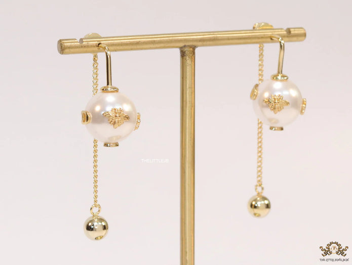 Detachable long chain pearl dangles in gold plating
