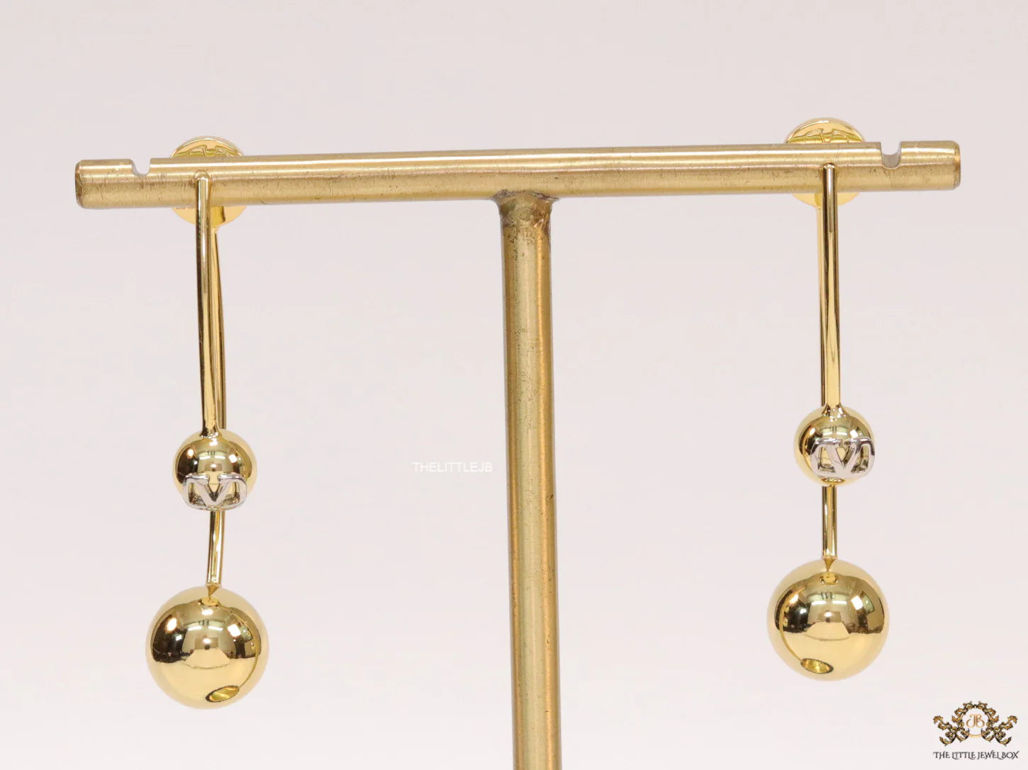 Open long twin lobed golden earrings