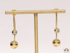 Open long twin lobed golden earrings