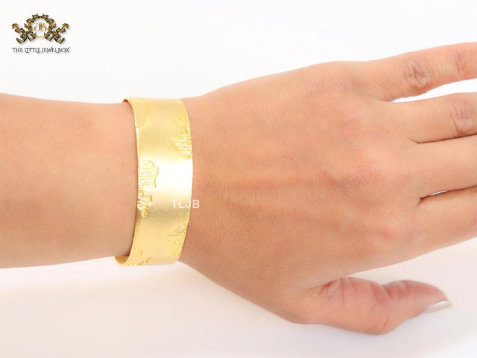 Abstract gold bracelet