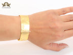 Abstract gold bracelet