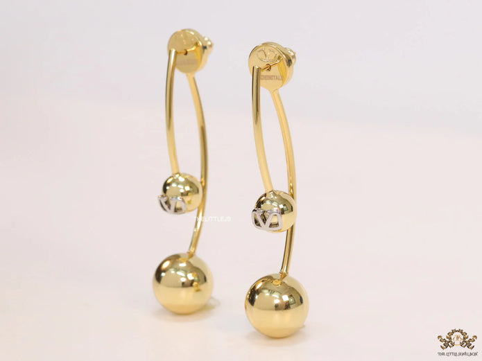 Open long twin lobed golden earrings