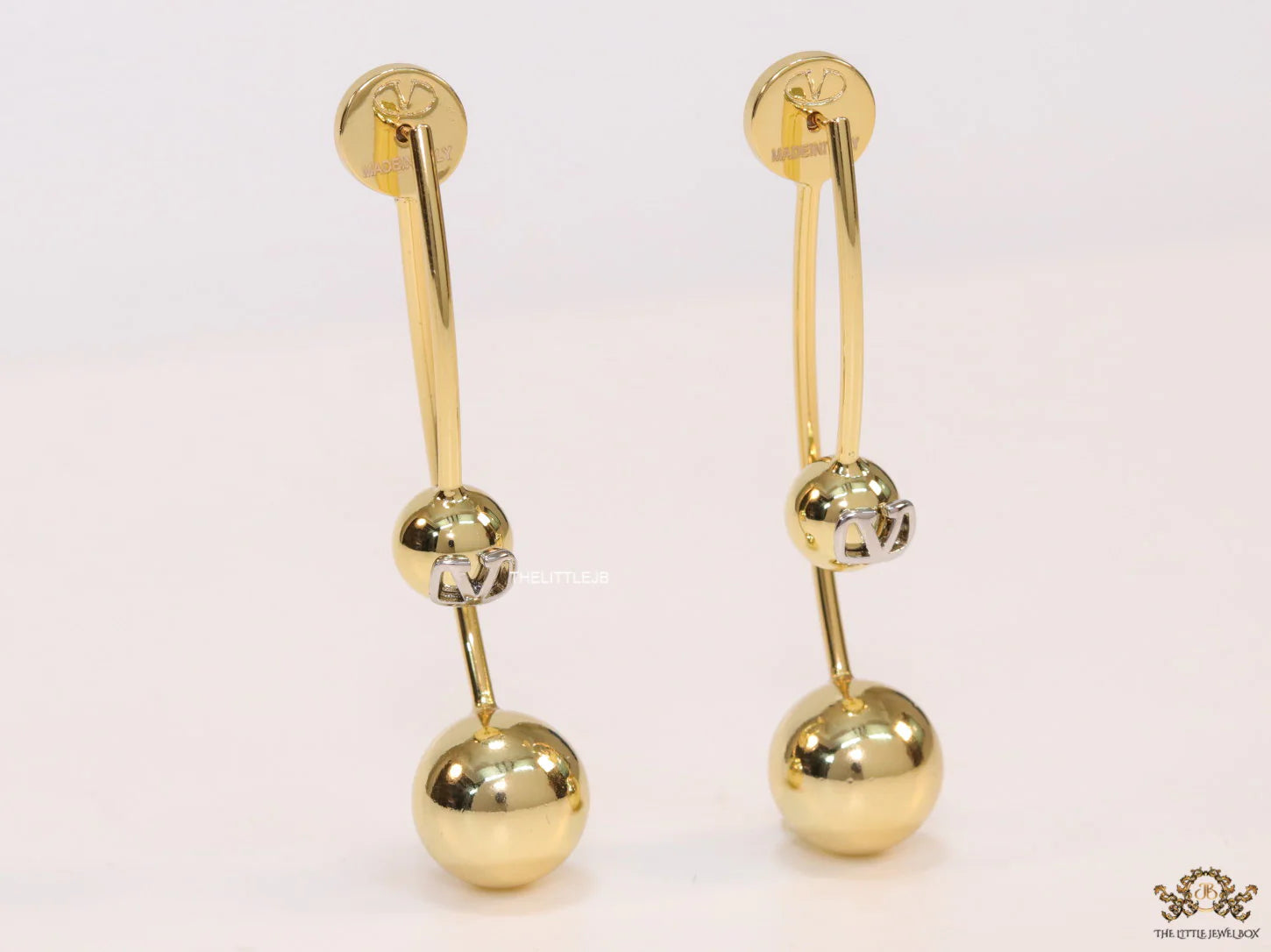 Open long twin lobed golden earrings