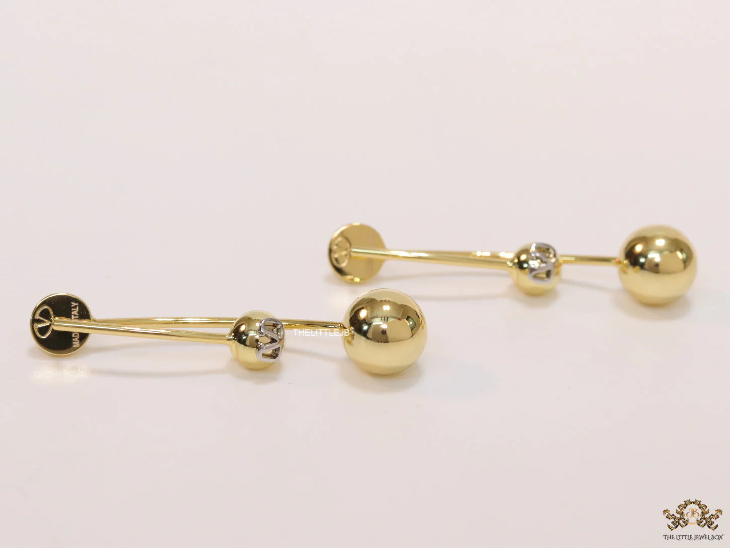 Open long twin lobed golden earrings