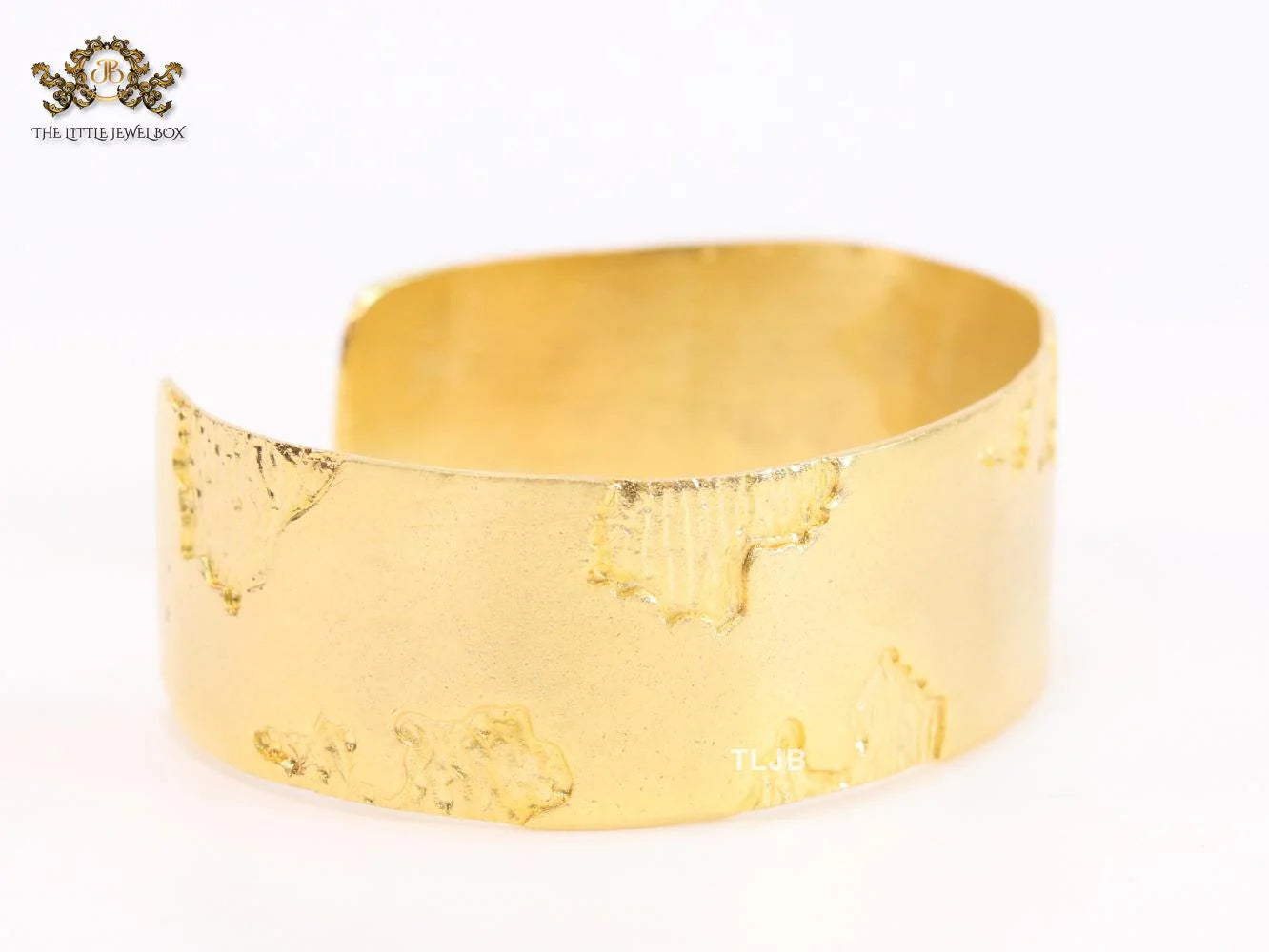 Abstract gold bracelet