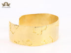 Abstract gold bracelet