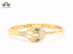 Snake head gold and white MOP bracelet with cz