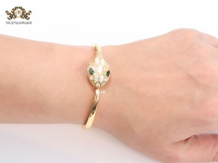 Snake head gold and white MOP bracelet with cz