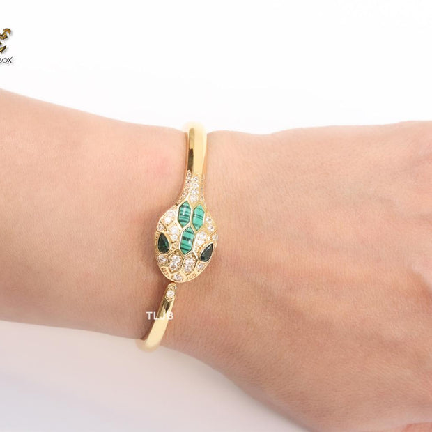 Snake head gold and green malachite bracelet with cz