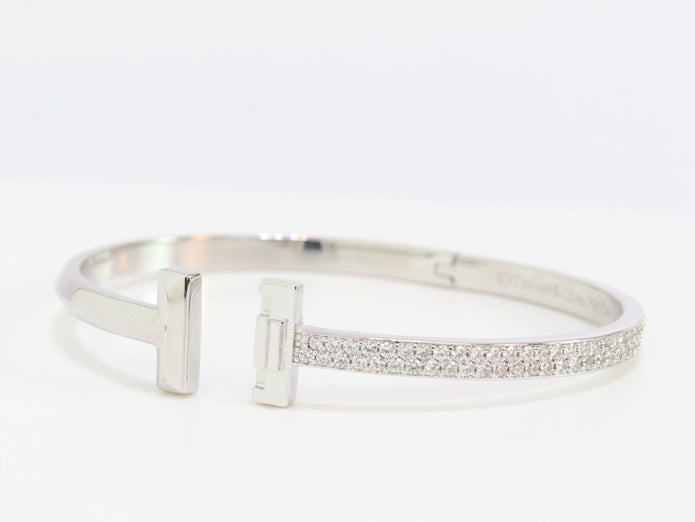 Alphabet T bracelet with half CZ in platinum finish
