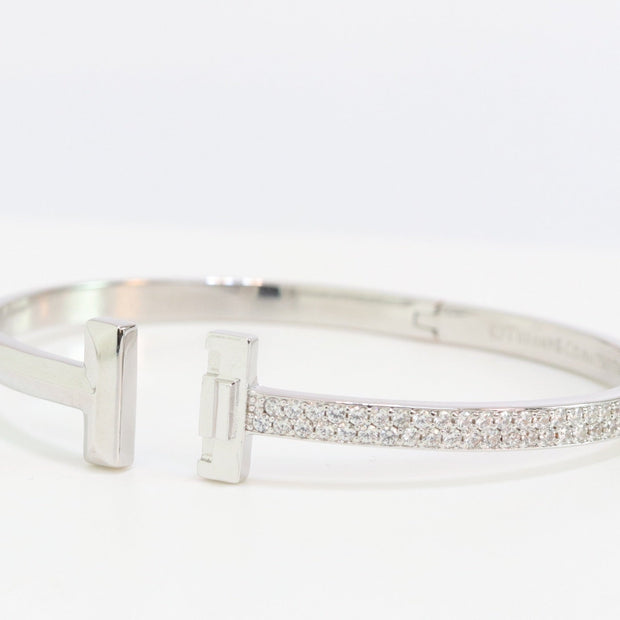 Alphabet T bracelet with half CZ in platinum finish