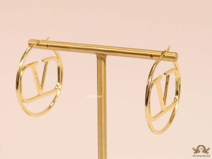 Gold plated hoops with alphabet motif
