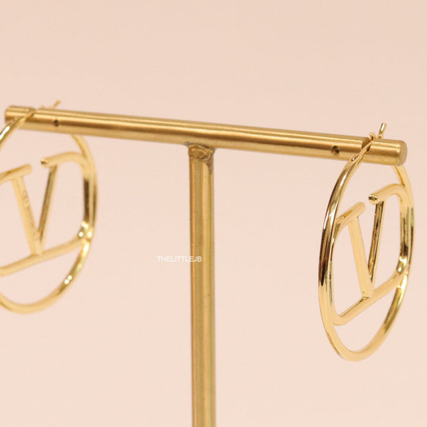 Gold plated hoops with alphabet motif
