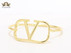 Sleek open V gold bracelet