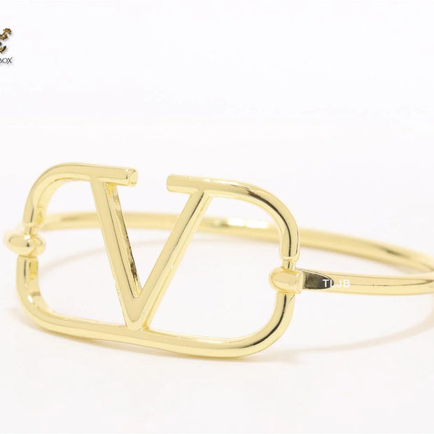 Sleek open V gold bracelet