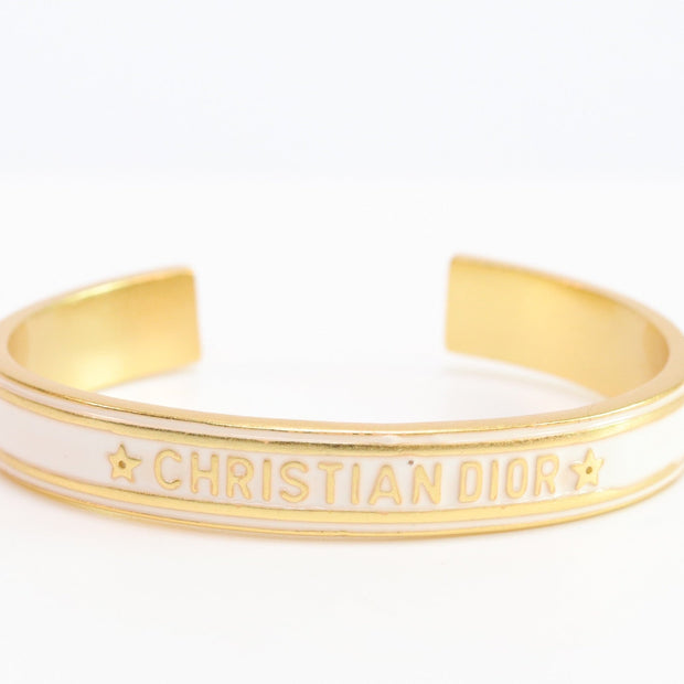 Alphabet C & D white open bracelet in gold finish