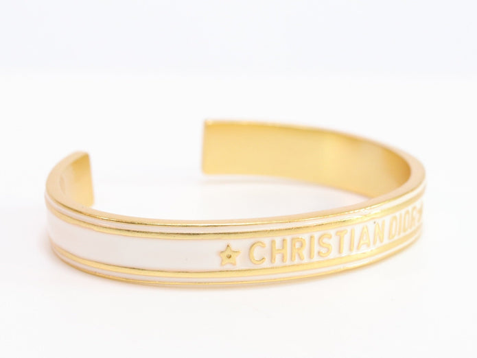 Alphabet C & D white open bracelet in gold finish