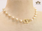 Alphabet V pearl and gold necklace