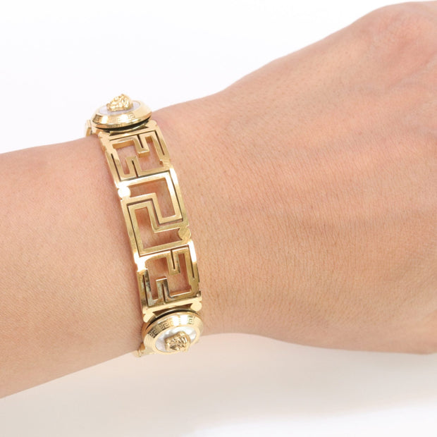 Alphabet V and Medusa Open Bracelet with gold finish