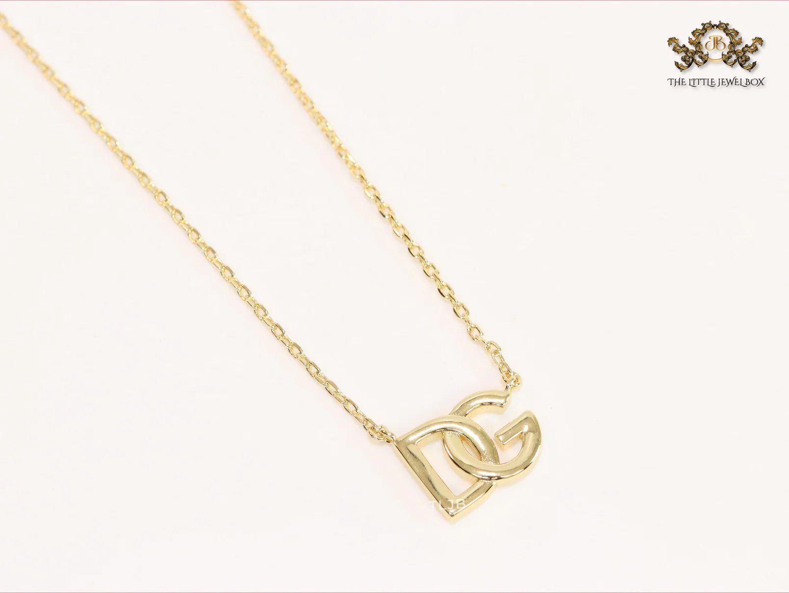 Alphabet D and G gold chain