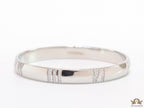 Platinum plated bracelet with cz roman numerals